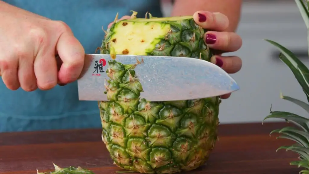 peeling pineapple