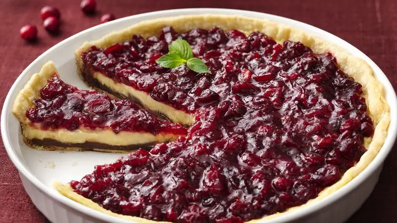 Making a pie with lingonberries